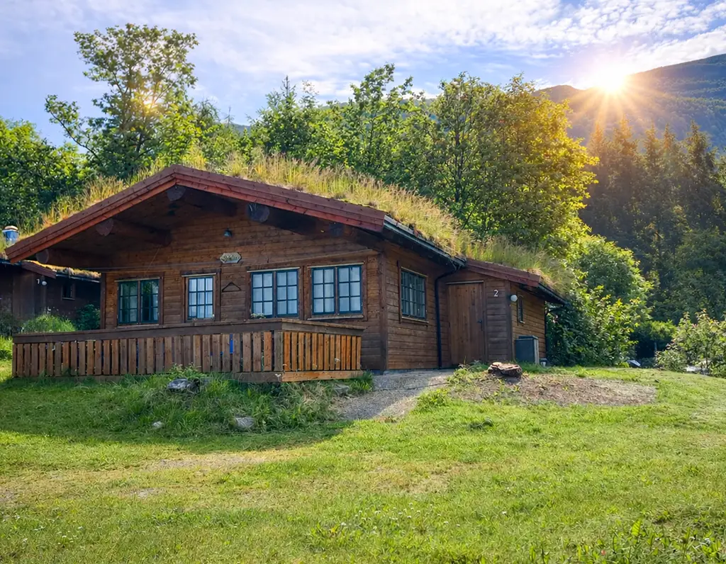 Holmemstranda – Haus 2 mit Boot vor der Tür am Fjord